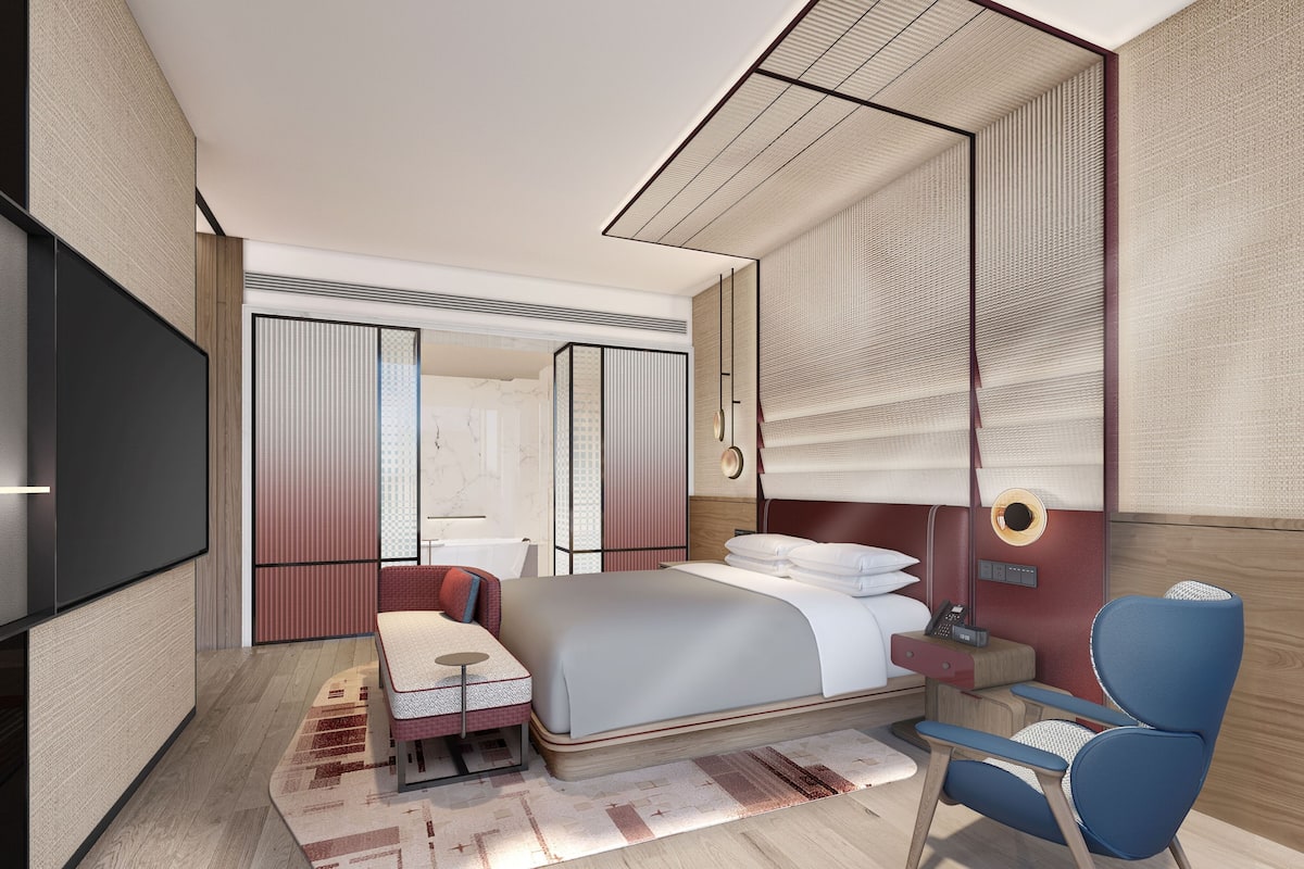Minibar, desk, blackout curtains, iron/ironing board