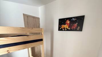 Iron/ironing board, travel crib, free WiFi, bed sheets