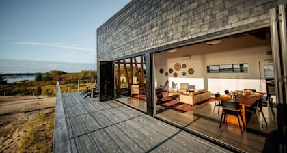 Timber Haus w/ Ramp - Timber Haus, one of our newest (and largest) cabins, is full of light with full windows and skylights. Queen bed. Sofa bed. Sleeps 4. Wheelchair friendly.