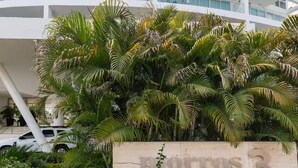 A modern multi-story building with balconies and a sign reading "Torres 3". - First line beach in Cartagena edif.morros 3 (Cartagena)