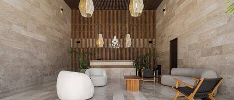 Een moderne lobby met een stenen muur, houten plafond en eigentijds meubilair.
