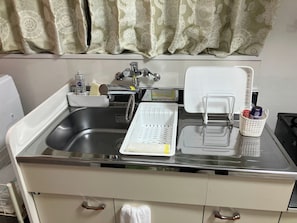 Fridge, microwave, stovetop, cookware/dishes/utensils
