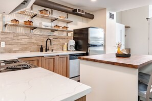 Fridge, microwave, oven, stovetop - East End Loft (Calgary)