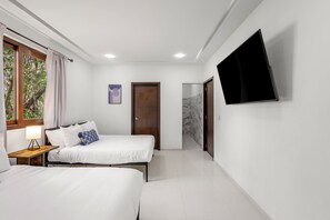 Deluxe House, Balcony, Garden View | In-room safe, iron/ironing board, free WiFi