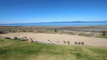 On the beach, sun loungers