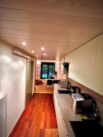 Private kitchen. Studio apartment in the heart of nature with shared pool and playground