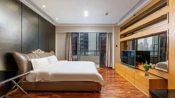 Desk, laptop workspace, blackout curtains, free WiFi