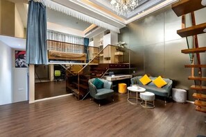 Superior Suite, City View | Desk, laptop workspace, blackout drapes, free WiFi