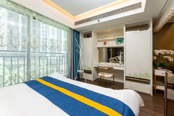 Superior Suite, City View | Desk, laptop workspace, blackout drapes, free WiFi