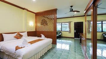 Deluxe Suite, 1 King Bed, Garden View | In-room safe, free WiFi, bed sheets