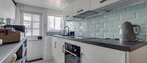 Fridge, microwave, oven, cookware/dishes/utensils