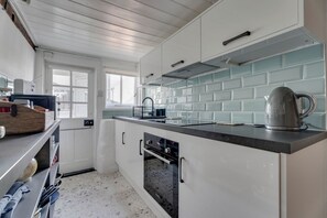 Fridge, microwave, oven, cookware/dishes/utensils