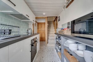 Fridge, microwave, oven, cookware/dishes/utensils