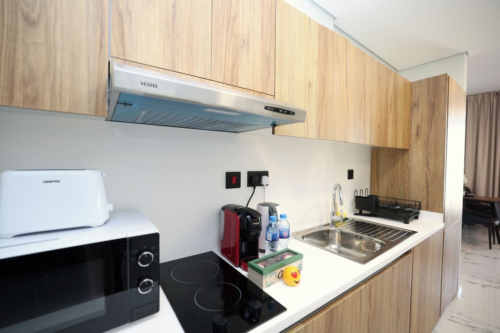 Fridge, microwave, toaster, cookware/dishes/utensils