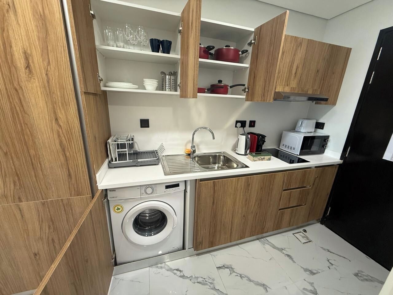 Fridge, microwave, toaster, cookware/dishes/utensils