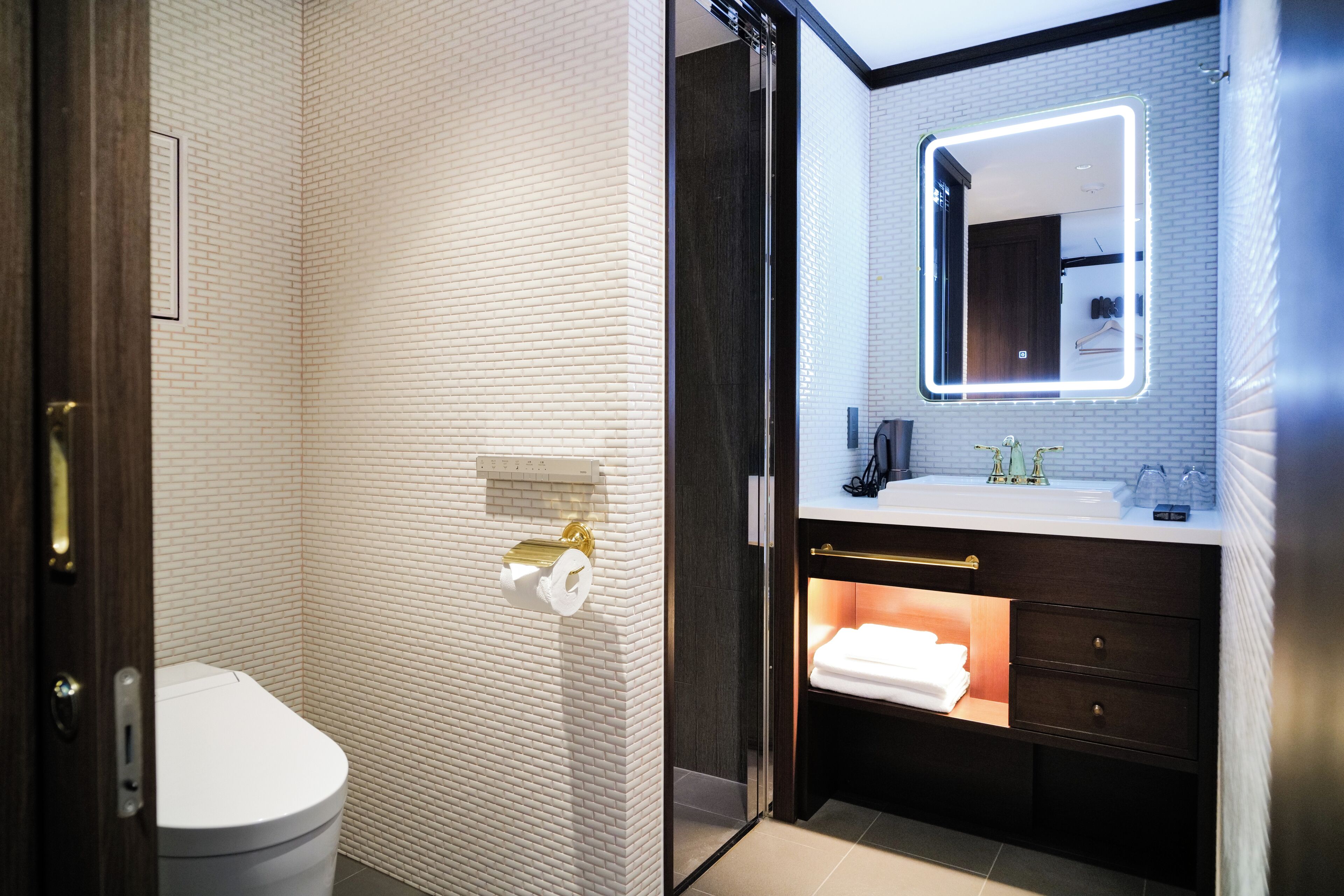 Twin Room, City View | Bathroom | Shower, hair dryer, slippers, towels