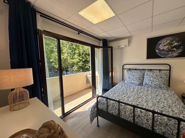 1 bedroom, desk, iron/ironing board, travel crib