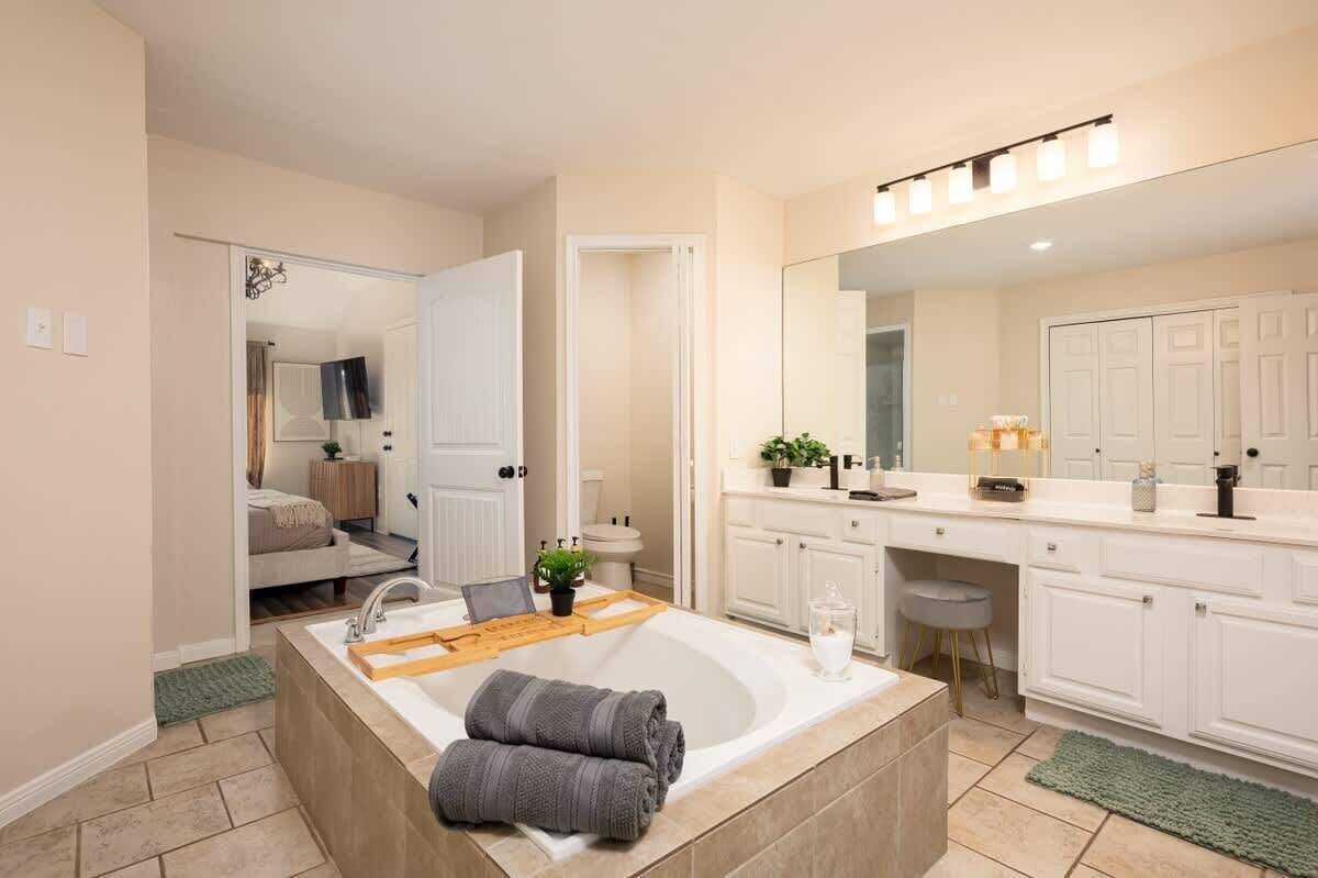 Shower, hair dryer, towels, shampoo