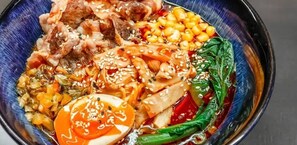 A bowl of food with various ingredients. - Sojourn Charming Lower Level Studio - Capitol Hill (District of Columbia)