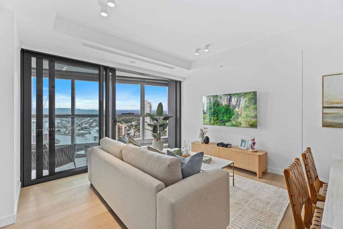 Executive Apartment, 2 Bedrooms, Balcony, Canal View | Living area | 75-cm Smart TV with digital channels