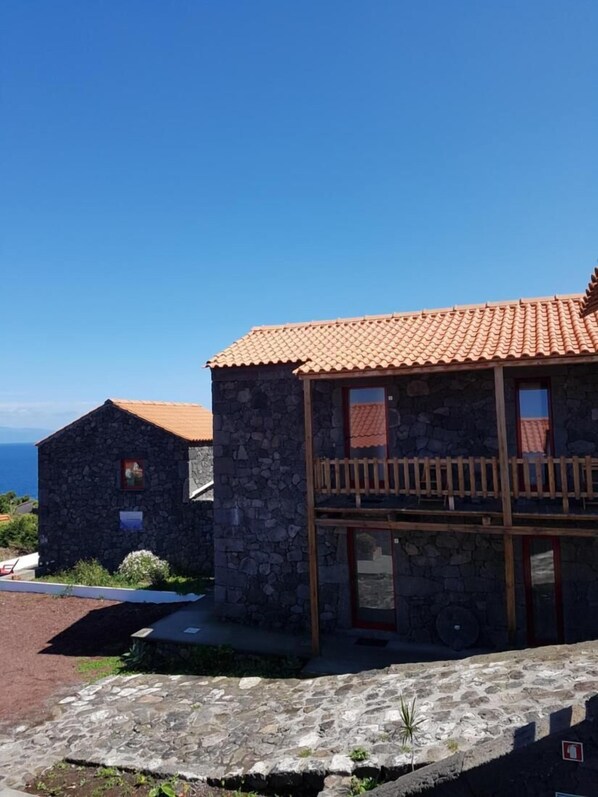 Quarto, 1 quarto, sacada, vista para o oceano | Entrada da propriedade
