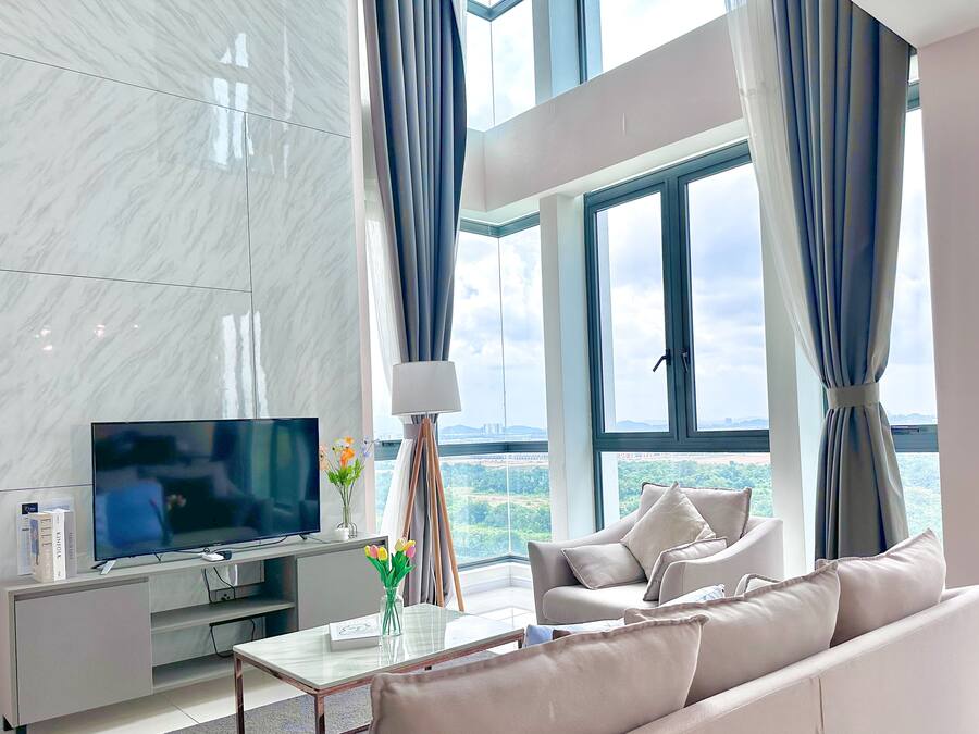 Deluxe Duplex, 3 Bedrooms | Living area | Flat-screen TV