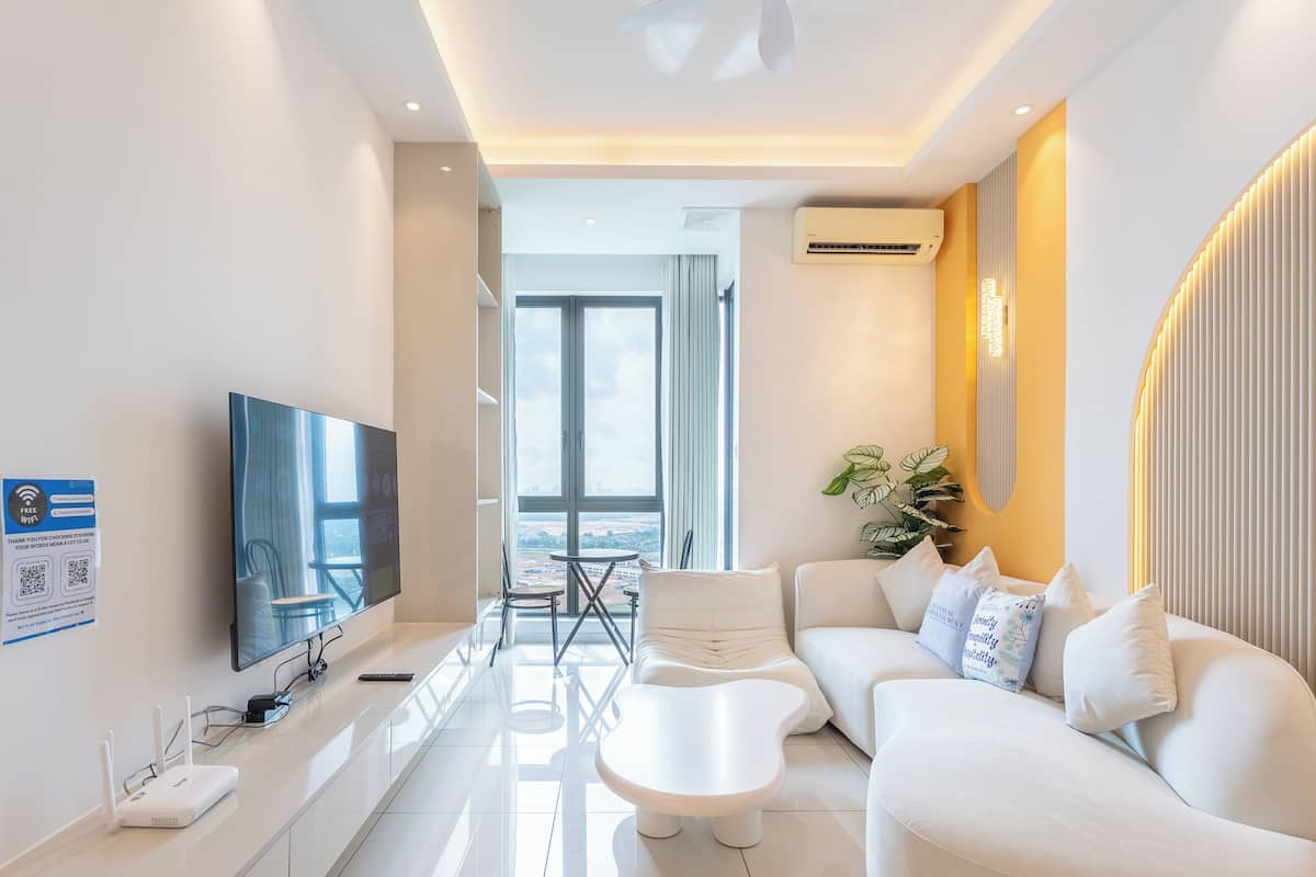 Design Apartment, 2 Bedrooms, Non Smoking, City View | Living area | 50-inch Smart TV with cable channels