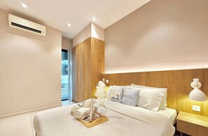 Condo, 2 habitaciones, vista a la ciudad | Cortinas blackout, tabla de planchar con plancha y wifi gratis