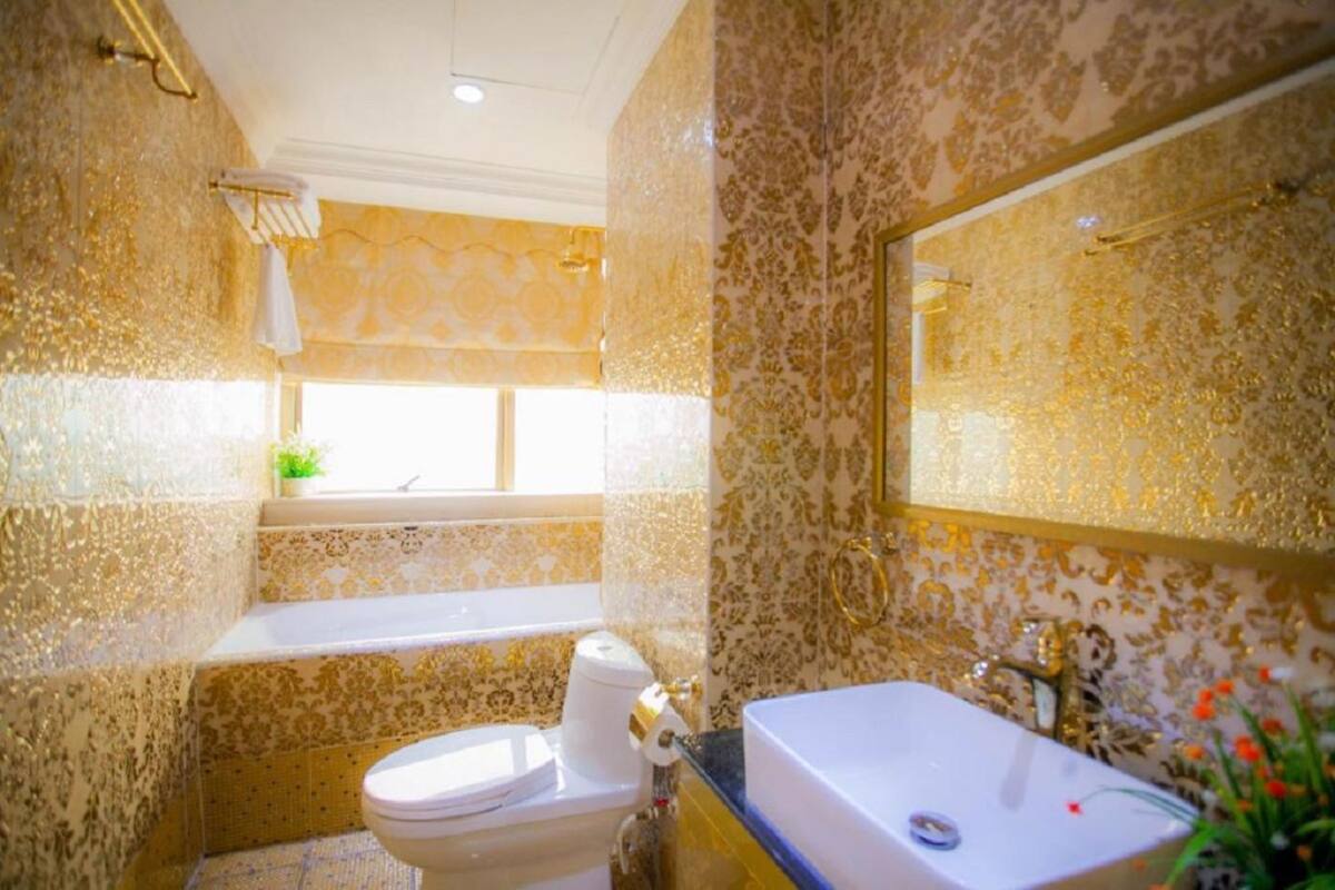 Shower, free toiletries, hair dryer, slippers
