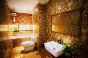 Shower, free toiletries, hair dryer, slippers
