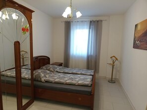 1 habitación, tabla de planchar con plancha, wifi y ropa de cama 