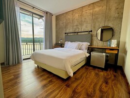 Standard Double Room, River View | Desk, laptop workspace, blackout drapes, iron/ironing board