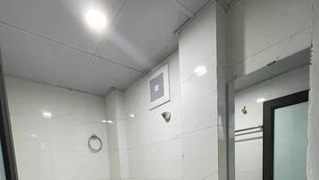 Shower, free toiletries, hair dryer, slippers