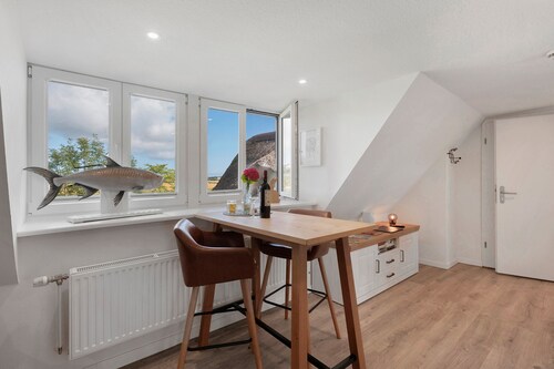 Ferienwohnung 'Ronnie Woodward' mit gemeinsamer Terrasse, Gemeinschaftsgarten und WLAN