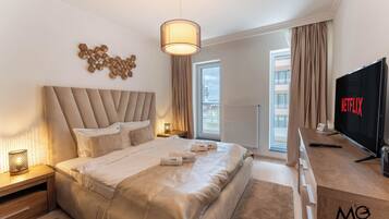 Premium bedding, down duvets, memory-foam beds, desk