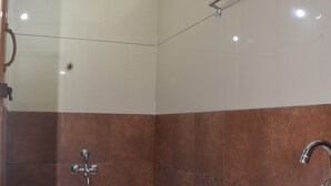 Family Room, City View | Bathroom - Sri Darshini Comfort (Mysore)