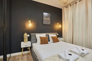 1 bedroom, laptop workspace, iron/ironing board, bed sheets