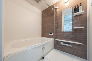 Room | Bathroom | Combined shower/tub, hair dryer, slippers, towels - LAKU HOTEL ASAKUSA (Tokyo)