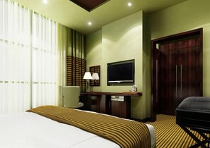 Minibar, tabla de planchar con plancha, wifi gratis y ropa de cama