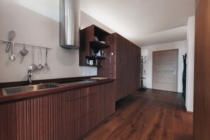Fridge, stovetop, electric kettle, high chair