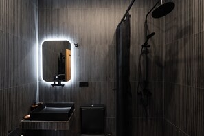 Shower, free toiletries, hair dryer, slippers