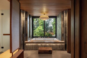 Suite | Bathroom | Separate tub and shower, rainfall showerhead, free toiletries