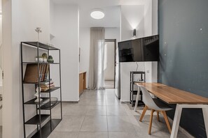 Appartement Familial, vue jardin | Coin séjour