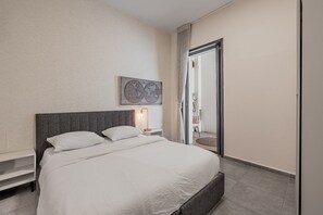 Family Apartment, Garden View | Iron/ironing board, free WiFi