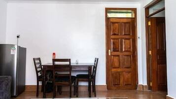 Classic Apartment, Balcony | In-room dining