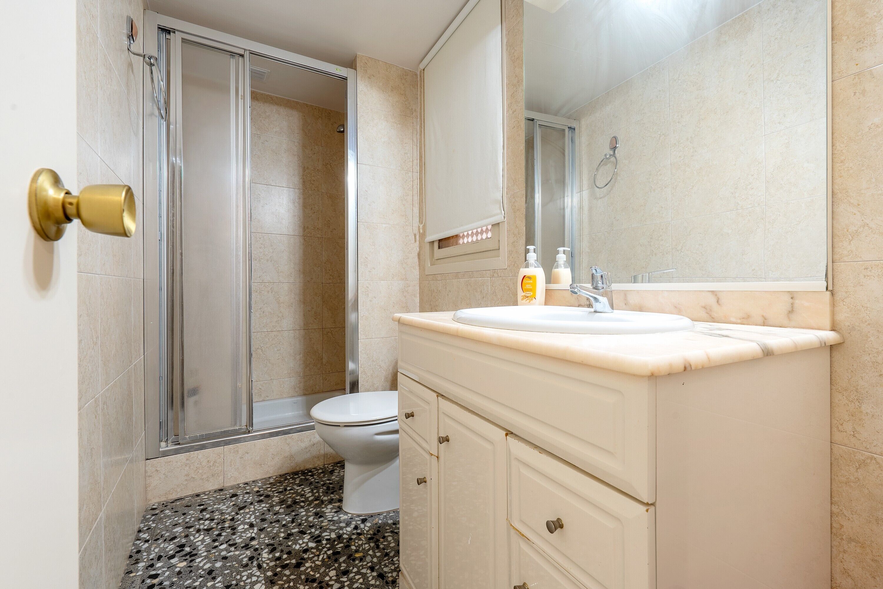 Een douche, handdoeken