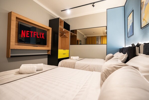 Premium bedding, memory foam beds, desk, blackout drapes