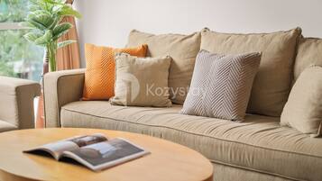 Apartment, 2 Bedrooms, City View | Living area | 43-inch Smart TV with cable channels, Netflix, streaming services