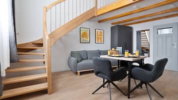 Superior-Apartment, 1 Queen-Bett und Schlafsofa | Wohnbereich