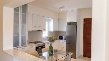 Luxury Apartment, Pool View | Private kitchen